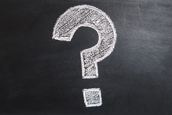 Question mark on chalkboard representing apostille FAQ page