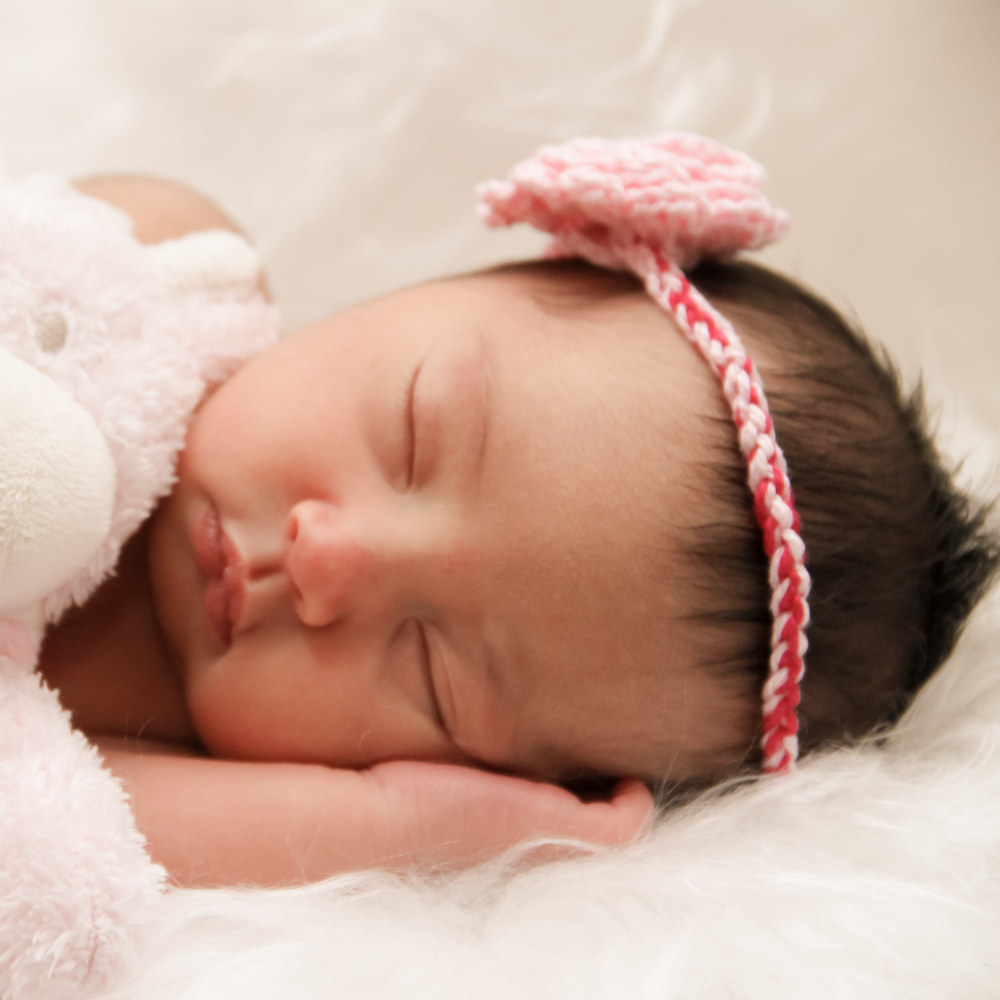 Sleeping newborn, representing link to birth certificate apostille page