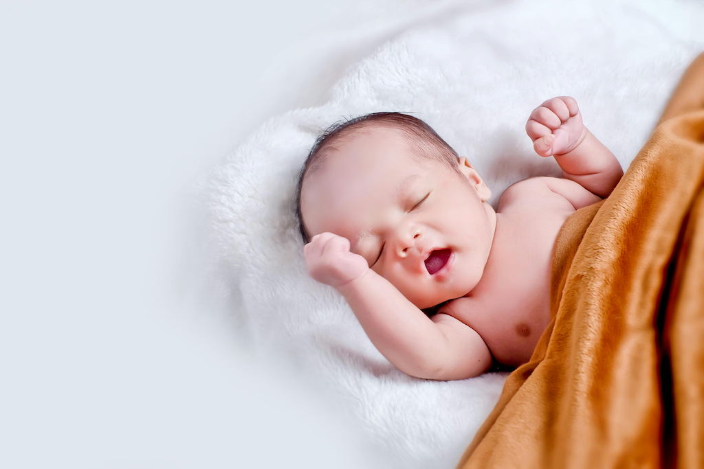 Yawning newborn, representing a certified copy of a San Mateo County birth certificate