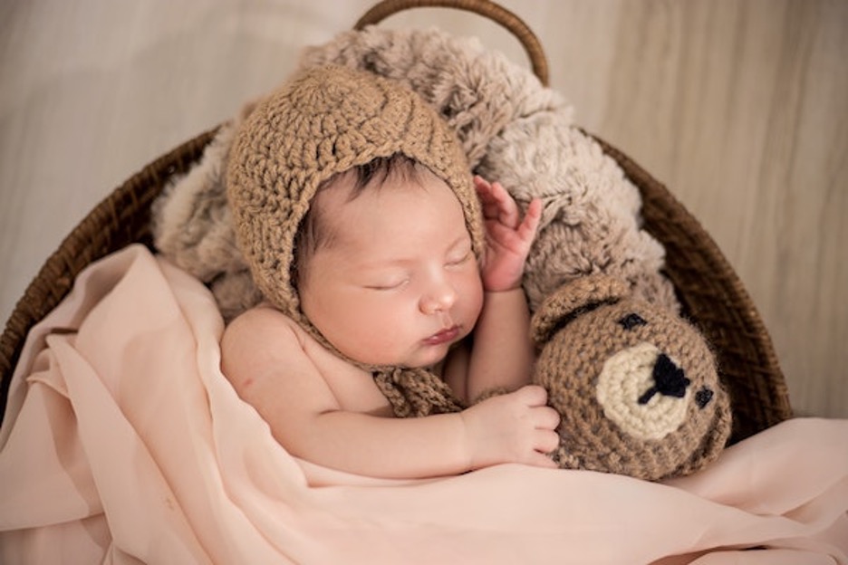 Sleeping newborn, representing a certified copy of a San Francisco County birth certificate